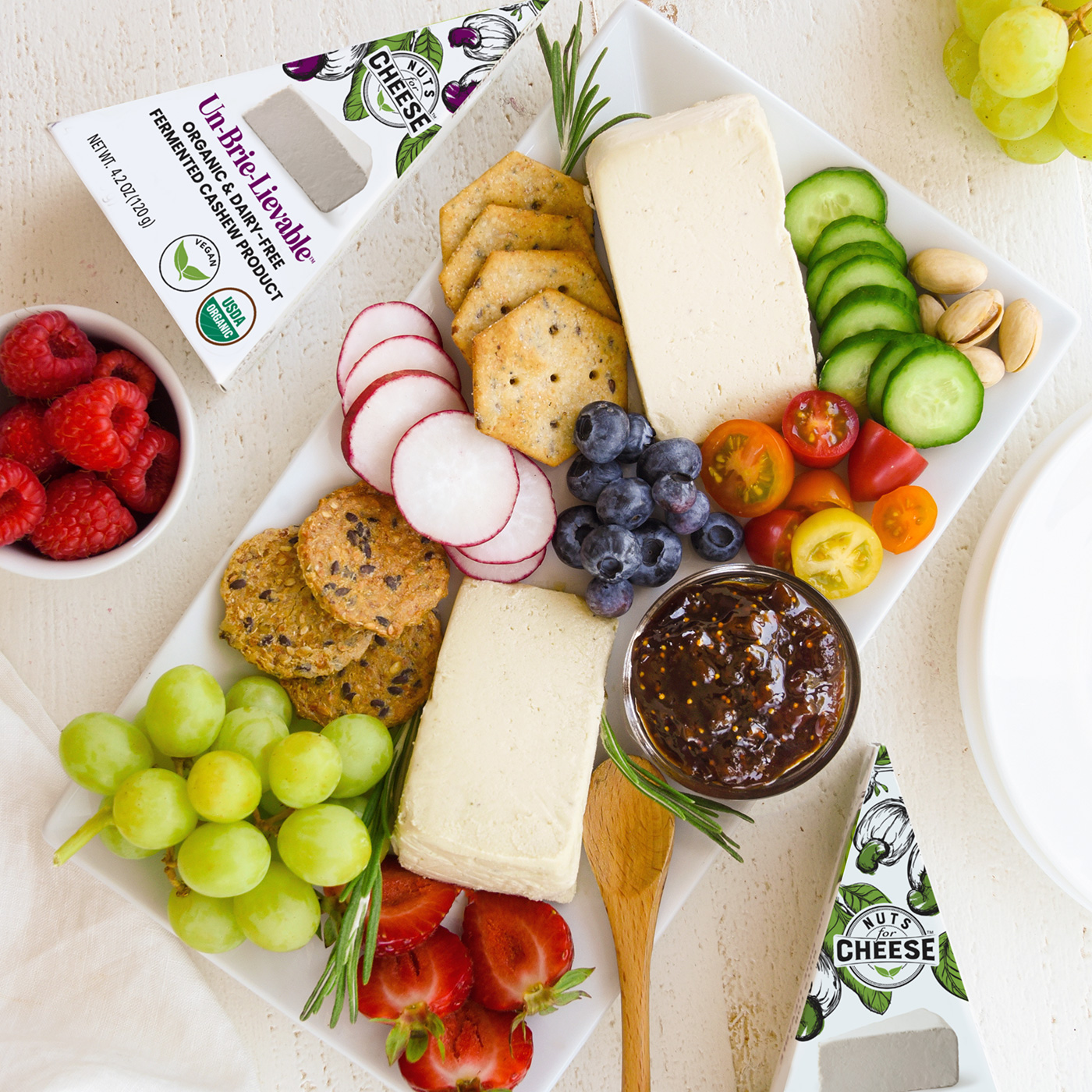 Nuts & Cheese with crackers on cutting board